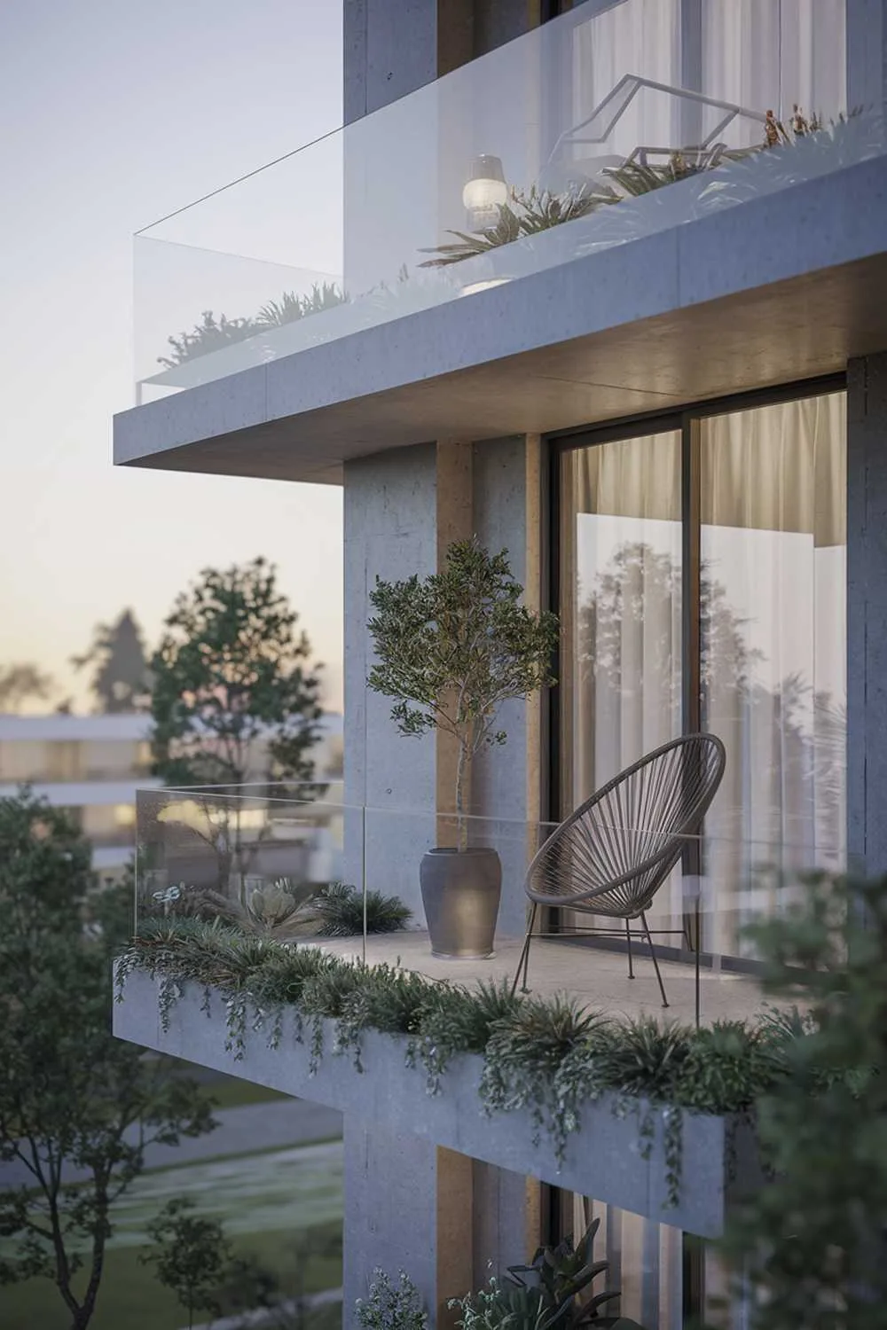24 Must-See Modern Balcony Design Ideas for Stylish Living 2 A modern balcony design and decor. The balcony has a glass railing and is made of concrete. There's a small potted plant and a stylish chair on the balcony. The background reveals a serene landscape with trees and a building. The overall image has a soft hue.
